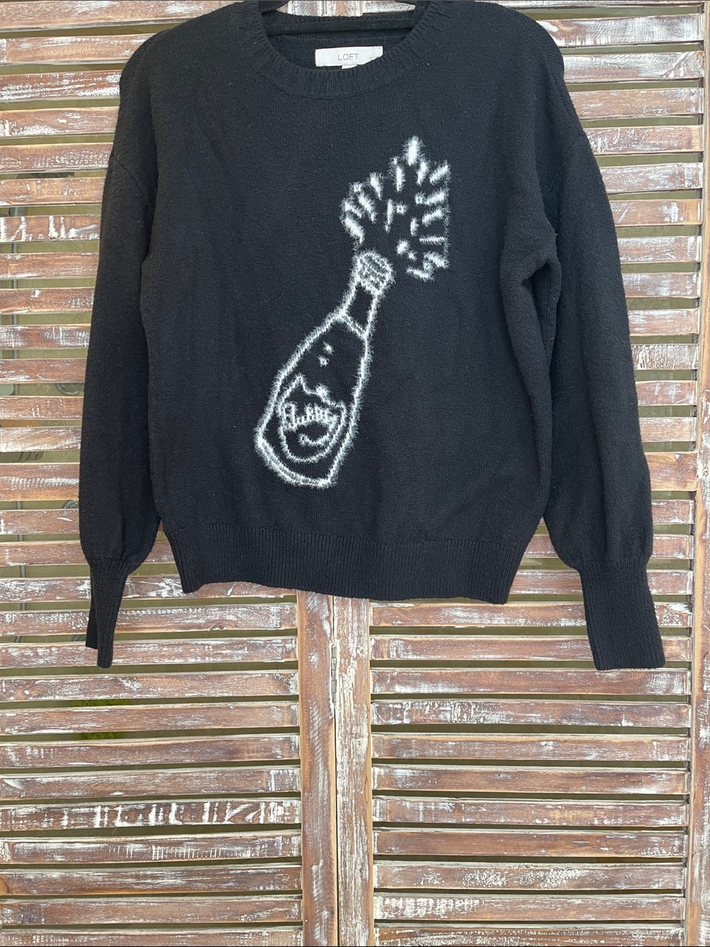 LOFT Black Crewneck Sweater with White Champagne Bottle Motif